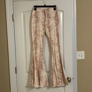 Snakeskin bell bottom pants size medium.